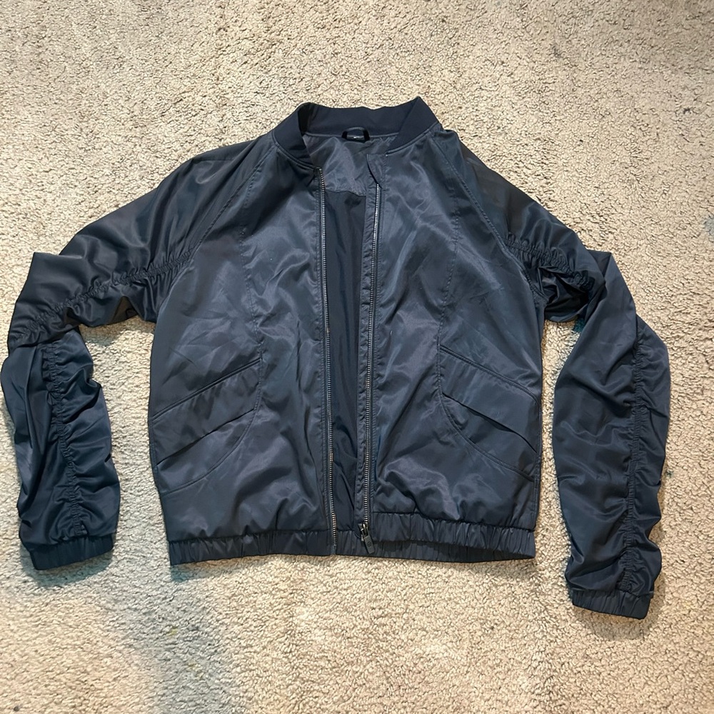 Lululemon Atletica Woman’s Above the Cloud Bomber Jacket Black Small Pinhole